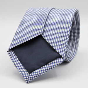 Holliday &amp; Brown for Cruciani &amp; Bella
100%&nbsp;Woven Jacquard Silk
Tipped
Royal Blue and White color motif tie
Handmade in Italy

8 cm x 150 cm
#9347