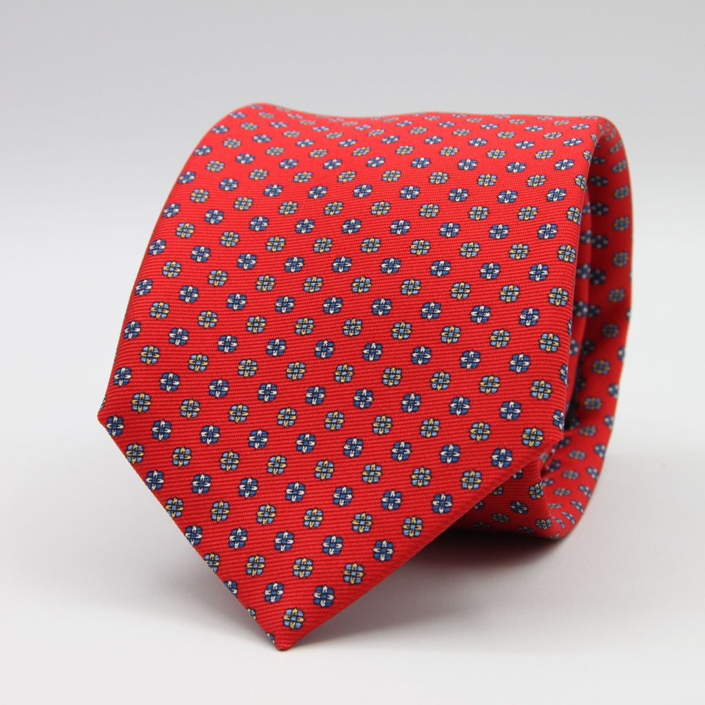 Holliday &amp; Brown for Cruciani &amp; Bella
100% Printed Silk
Self Tipped
Red, Royal Blue, Light Blue and Yellow motif Tie
Handmade in Italy
8 cm x 150 cm
#9353