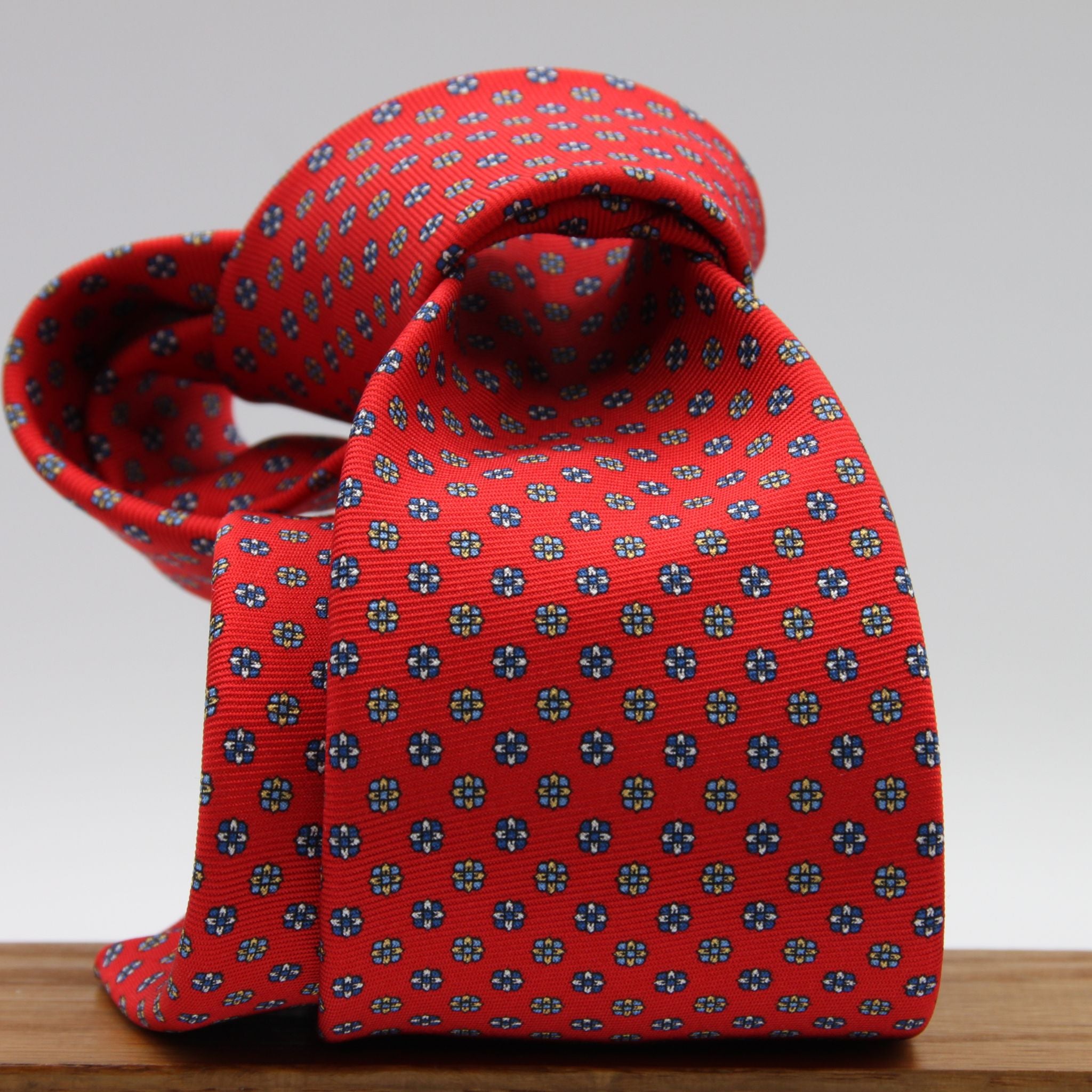 Holliday &amp; Brown for Cruciani &amp; Bella
100% Printed Silk
Self Tipped
Red, Royal Blue, Light Blue and Yellow motif Tie
Handmade in Italy
8 cm x 150 cm
#9353