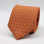 Holliday &amp; Brown for Cruciani &amp; Bella
100% Printed Silk
Self Tipped
Light Orange, Navy Blue, Light Blue and White motif Tie
Handmade in Italy
8 cm x 150 cm
#9354