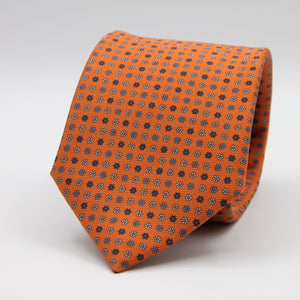 Holliday &amp; Brown for Cruciani &amp; Bella
100% Printed Silk
Self Tipped
Light Orange, Navy Blue, Light Blue and White motif Tie
Handmade in Italy
8 cm x 150 cm
#9354