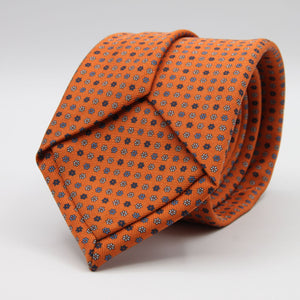 Holliday &amp; Brown for Cruciani &amp; Bella
100% Printed Silk
Self Tipped
Light Orange, Navy Blue, Light Blue and White motif Tie
Handmade in Italy
8 cm x 150 cm
#9354
