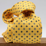Holliday &amp; Brown for Cruciani &amp; Bella
100% Printed Silk
Self Tipped
Yellow, Navy Blue, Light Blue and White motif Tie
Handmade in Italy
8 cm x 150 cm
#9356