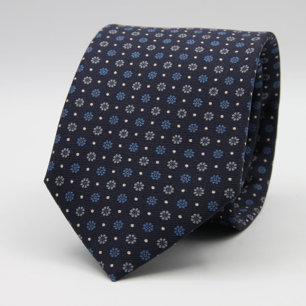 Holliday &amp; Brown for Cruciani &amp; Bella
100% Printed Silk
Self Tipped
Dark Blue, Light Blue, Grey and Fuchsia motif Tie
Handmade in Italy
8 cm x 150 cm
#9360