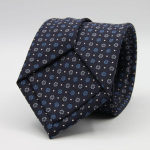 Holliday &amp; Brown for Cruciani &amp; Bella
100% Printed Silk
Self Tipped
Dark Blue, Light Blue, Grey and Fuchsia motif Tie
Handmade in Italy
8 cm x 150 cm
#9360