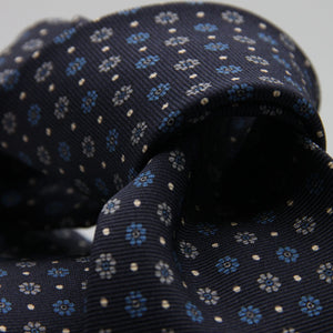 Holliday &amp; Brown for Cruciani &amp; Bella
100% Printed Silk
Self Tipped
Dark Blue, Light Blue, Grey and Fuchsia motif Tie
Handmade in Italy
8 cm x 150 cm
#9360
