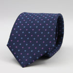 Holliday &amp; Brown for Cruciani &amp; Bella
100% Printed Silk
Self Tipped
Navy Blue, Purple and Light Blue motif Tie
Handmade in Italy
8 cm x 150 cm
#9361