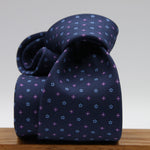 Holliday &amp; Brown for Cruciani &amp; Bella
100% Printed Silk
Self Tipped
Navy Blue, Purple and Light Blue motif Tie
Handmade in Italy
8 cm x 150 cm
#9361