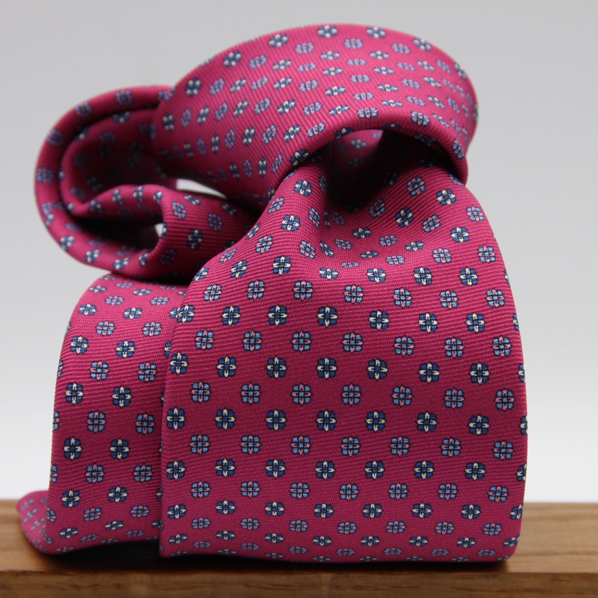 Holliday &amp; Brown for Cruciani &amp; Bella
100% Printed Silk
Self Tipped
Magenta, Blue, Pink, Light Blue and White motif Tie
Handmade in Italy
8 cm x 150 cm
#9364