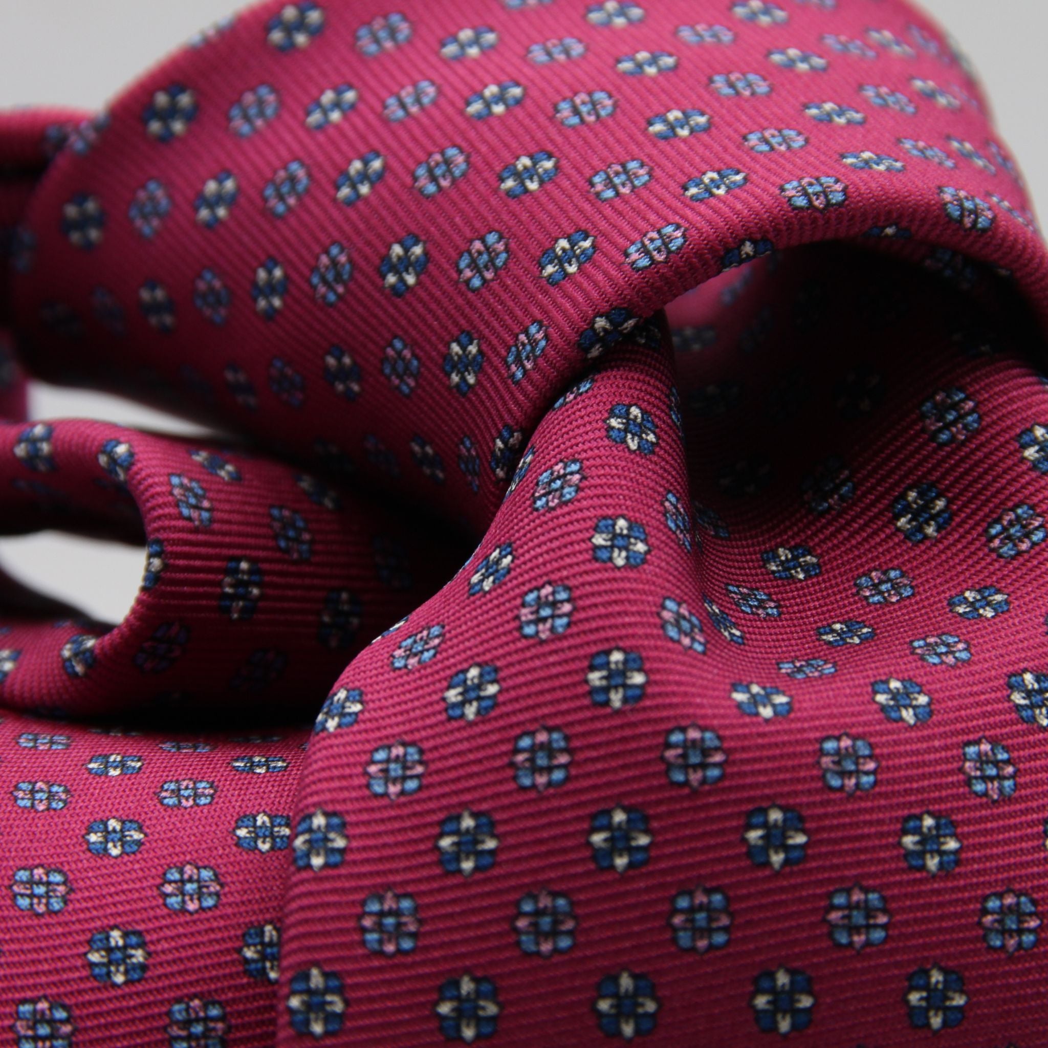 Holliday &amp; Brown for Cruciani &amp; Bella
100% Printed Silk
Self Tipped
Magenta, Blue, Pink, Light Blue and White motif Tie
Handmade in Italy
8 cm x 150 cm
#9364