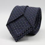 Holliday &amp; Brown for Cruciani &amp; Bella
100% Printed Silk
Self Tipped
Navy Blue, Light Blue and White motif Tie
Handmade in Italy
8 cm x 150 cm
#9365