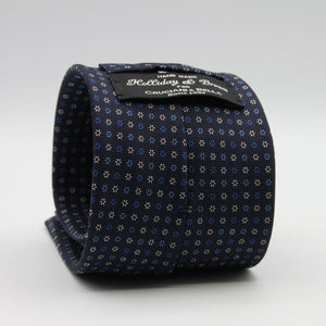 Holliday &amp; Brown for Cruciani &amp; Bella
100% Printed Silk
Self Tipped
Navy Blue, Light Blue and White motif Tie
Handmade in Italy
8 cm x 150 cm
#9365