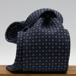Holliday &amp; Brown for Cruciani &amp; Bella
100% Printed Silk
Self Tipped
Navy Blue, Light Blue and White motif Tie
Handmade in Italy
8 cm x 150 cm
#9365