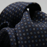 Holliday &amp; Brown for Cruciani &amp; Bella
100% Printed Silk
Self Tipped
Navy Blue, Light Blue and White motif Tie
Handmade in Italy
8 cm x 150 cm
#9365