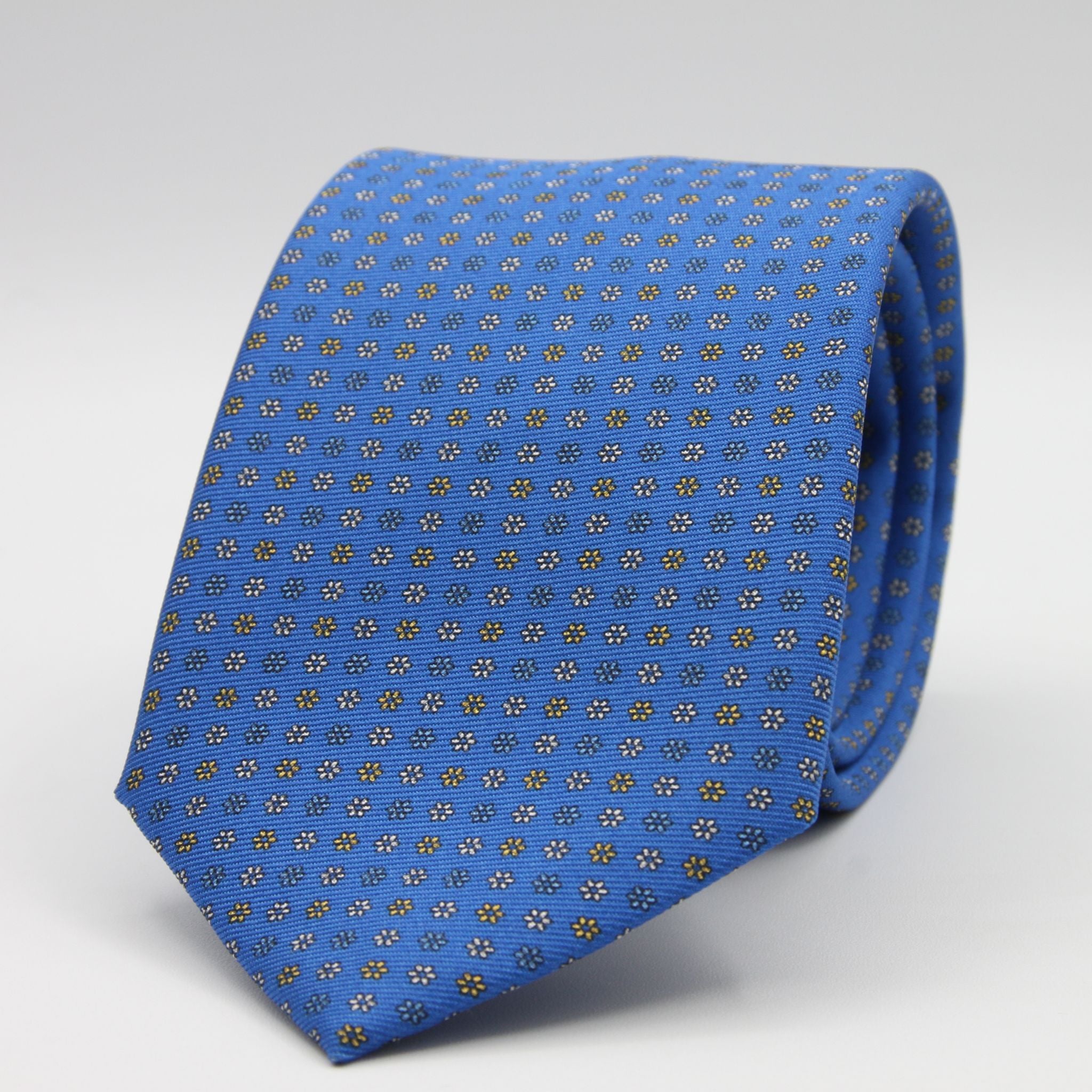 Holliday &amp; Brown for Cruciani &amp; Bella
100% Printed Silk
Self Tipped
Light Blue, Yellow and White motif Tie
Handmade in Italy
8 cm x 150 cm
#9366