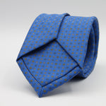 Holliday &amp; Brown for Cruciani &amp; Bella
100% Printed Silk
Self Tipped
Light Blue, Yellow and White motif Tie
Handmade in Italy
8 cm x 150 cm
#9366