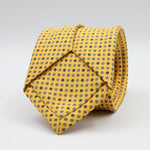 Holliday &amp; Brown for Cruciani &amp; Bella
100% Printed Silk
Self Tipped
Yellow, Navy Blue, Light Blue and White motif Tie
Handmade in Italy
8 cm x 150 cm
#9367