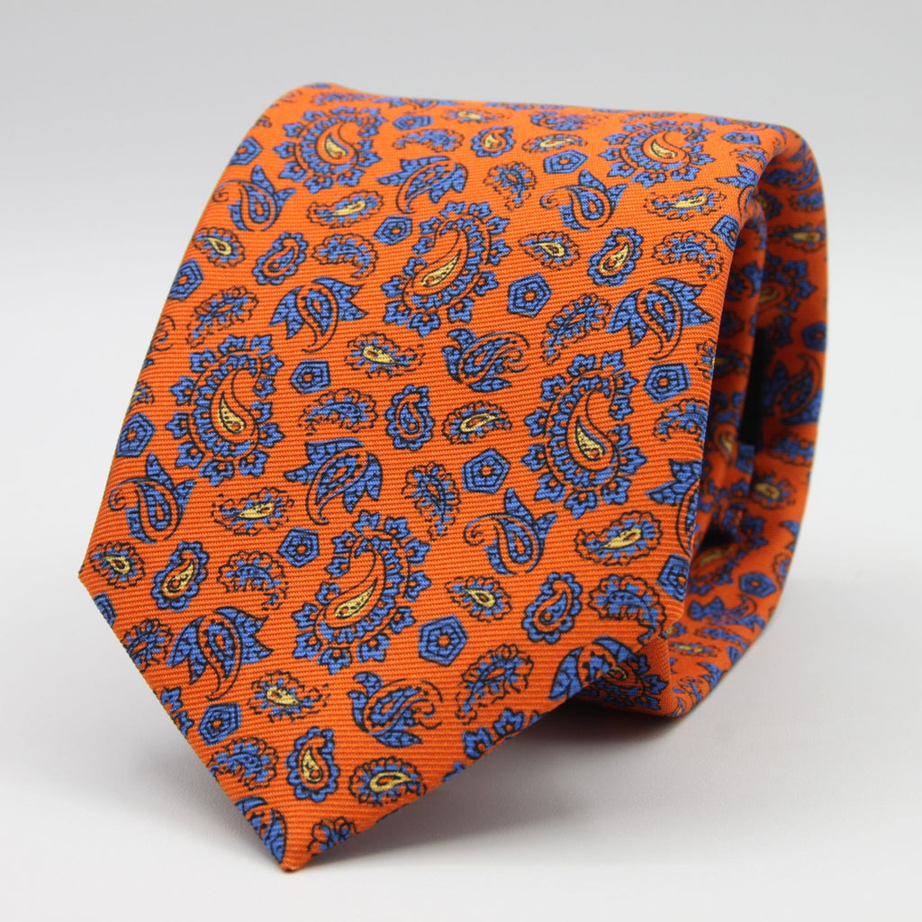 Holliday &amp; Brown for Cruciani &amp; Bella
100% Printed Silk
Self Tipped
Orange, Light Blue and Yellow motif Tie
Handmade in Italy
8 cm x 150 cm
#9368