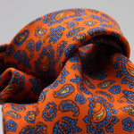 Holliday &amp; Brown for Cruciani &amp; Bella
100% Printed Silk
Self Tipped
Orange, Light Blue and Yellow motif Tie
Handmade in Italy
8 cm x 150 cm
#9368