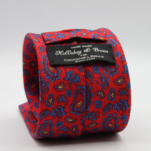 Holliday &amp; Brown for Cruciani &amp; Bella
100% Printed Silk
Self Tipped
Red, Light Blue and Yellow motif Tie
Handmade in Italy
8 cm x 150 cm
#9369