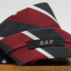 Holliday &amp; Brown
100% Jacquard Silk
Tipped
"R.A.F." Regimental Tie

Handmade in Italy
8 cm x 148 cm
#8813