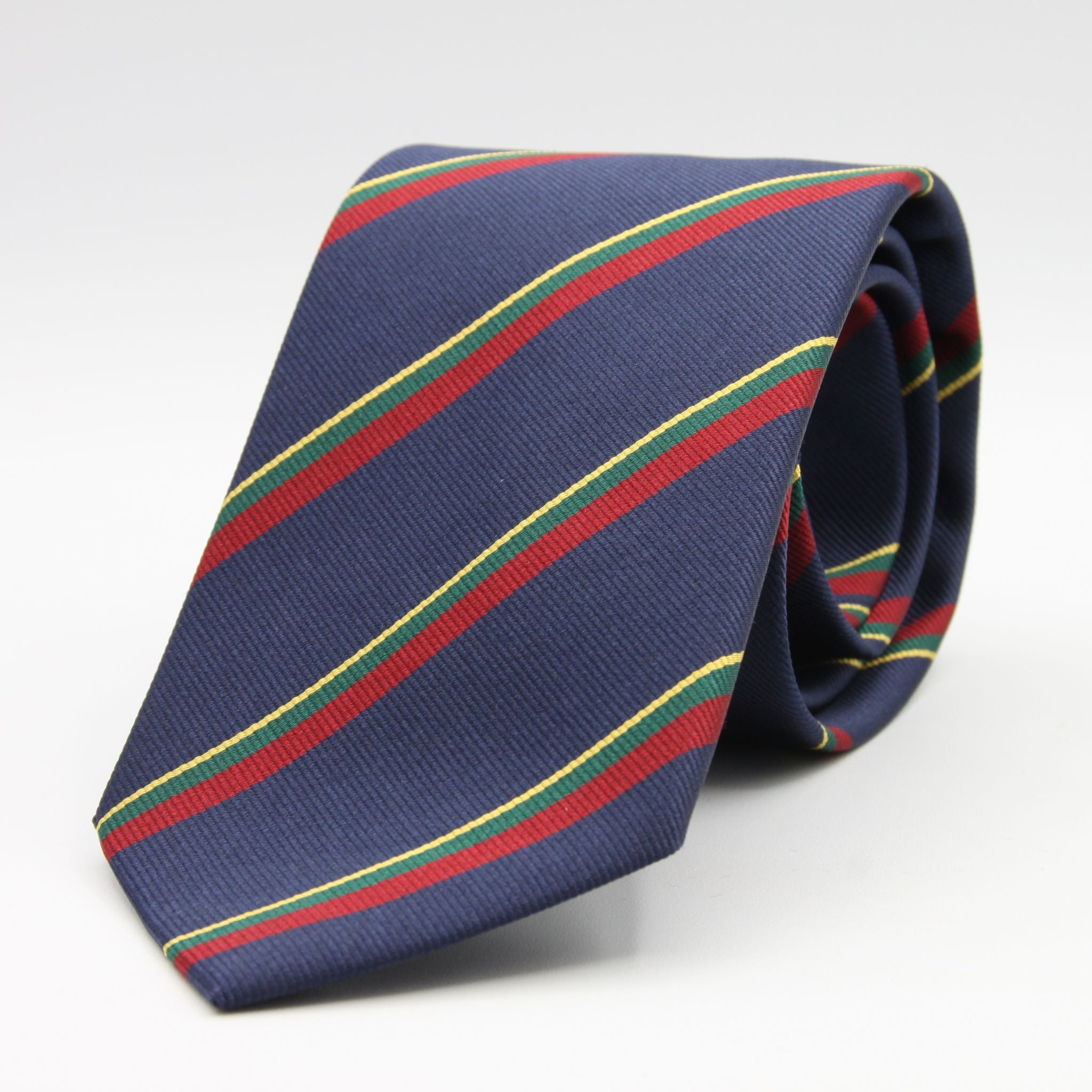 Holliday &amp; Brown
100% Jacquard Silk
Tipped
"Royal Marines" Regimental Tie
Blue, Red, Green and Yellow Stripes
Handmade in Italy
8 cm x 148 cm
#8810