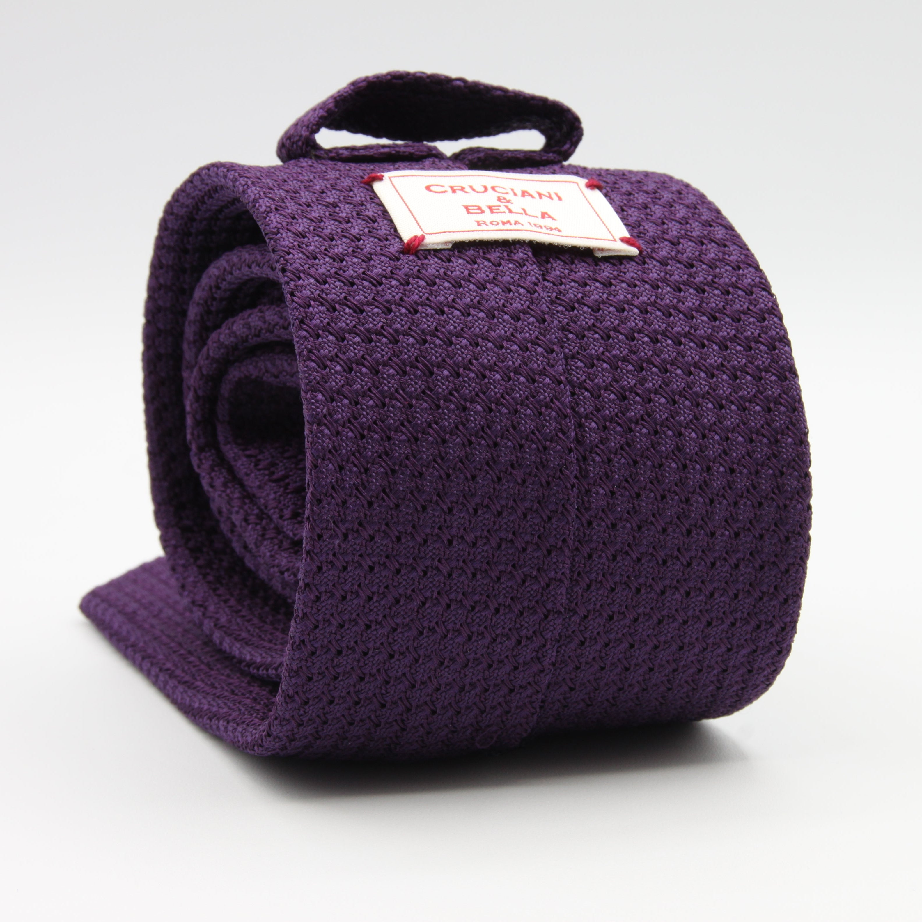 Cruciani &amp; Bella Tie
100% Silk Grenadine Garza Grossa

Tipped
Plain Purple Tie
Handmade in Italy
8 cm x 150 cm

#9499