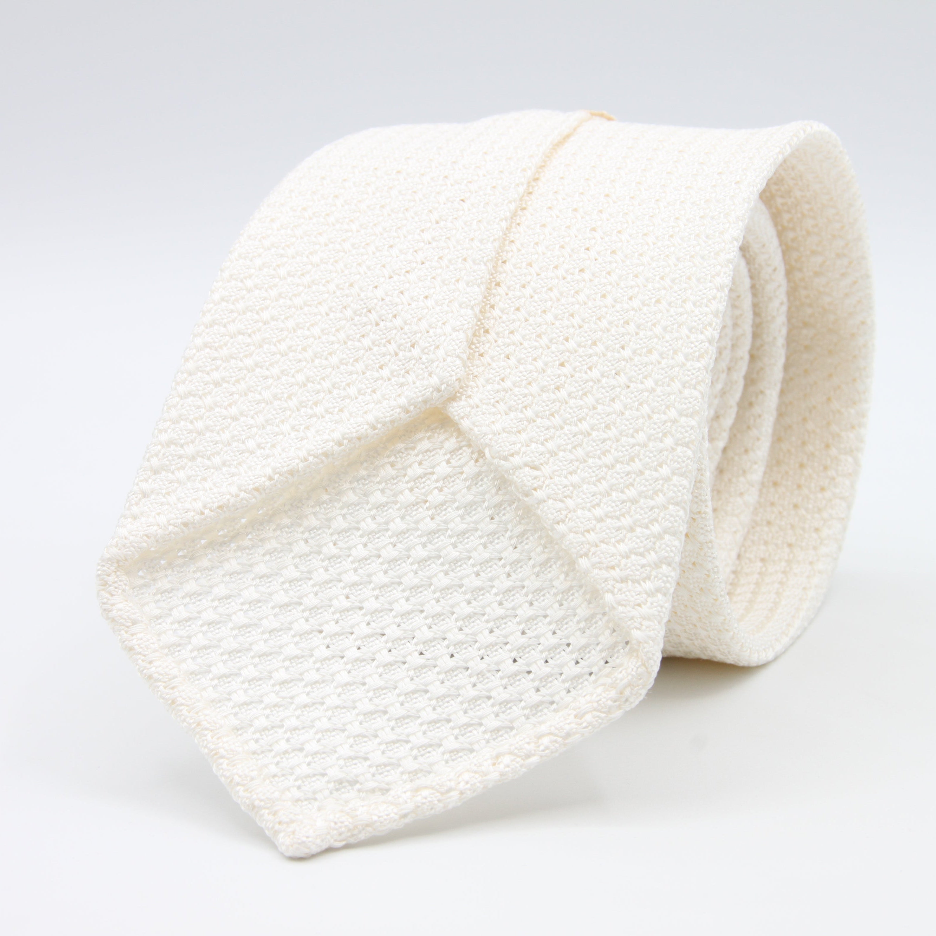 Cruciani &amp; Bella Tie
100% Silk Grenadine Garza Grossa

Unlined
Plain White Tie
Handmade in Italy
8 cm x 150 cm

#9502