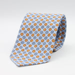 Cruciani &amp; Bella Tie
Handmade and Printed in Italy
Unlined
Hand Rolled
Sky Blue, Light Blue and Orange Tie
100% Printed Madder Silk
8 X 150 Cm
#9538
