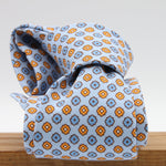 Cruciani &amp; Bella Tie
Handmade and Printed in Italy
Unlined
Hand Rolled
Sky Blue, Light Blue and Orange Tie
100% Printed Madder Silk
8 X 150 Cm
#9538