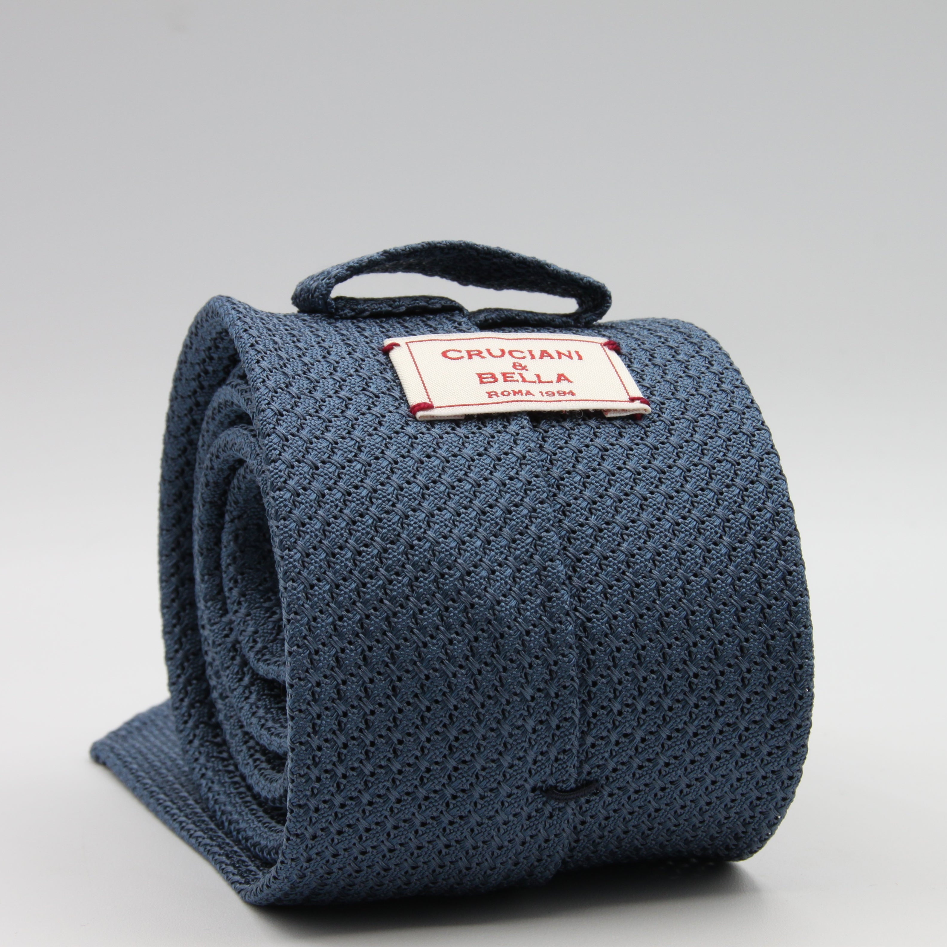 Cruciani &amp; Bella Tie
100% Silk Grenadine Garza Grossa

Unlined
Plain Light Blue Blue Tie
Handmade in Italy
8 cm x 150 cm

#8601