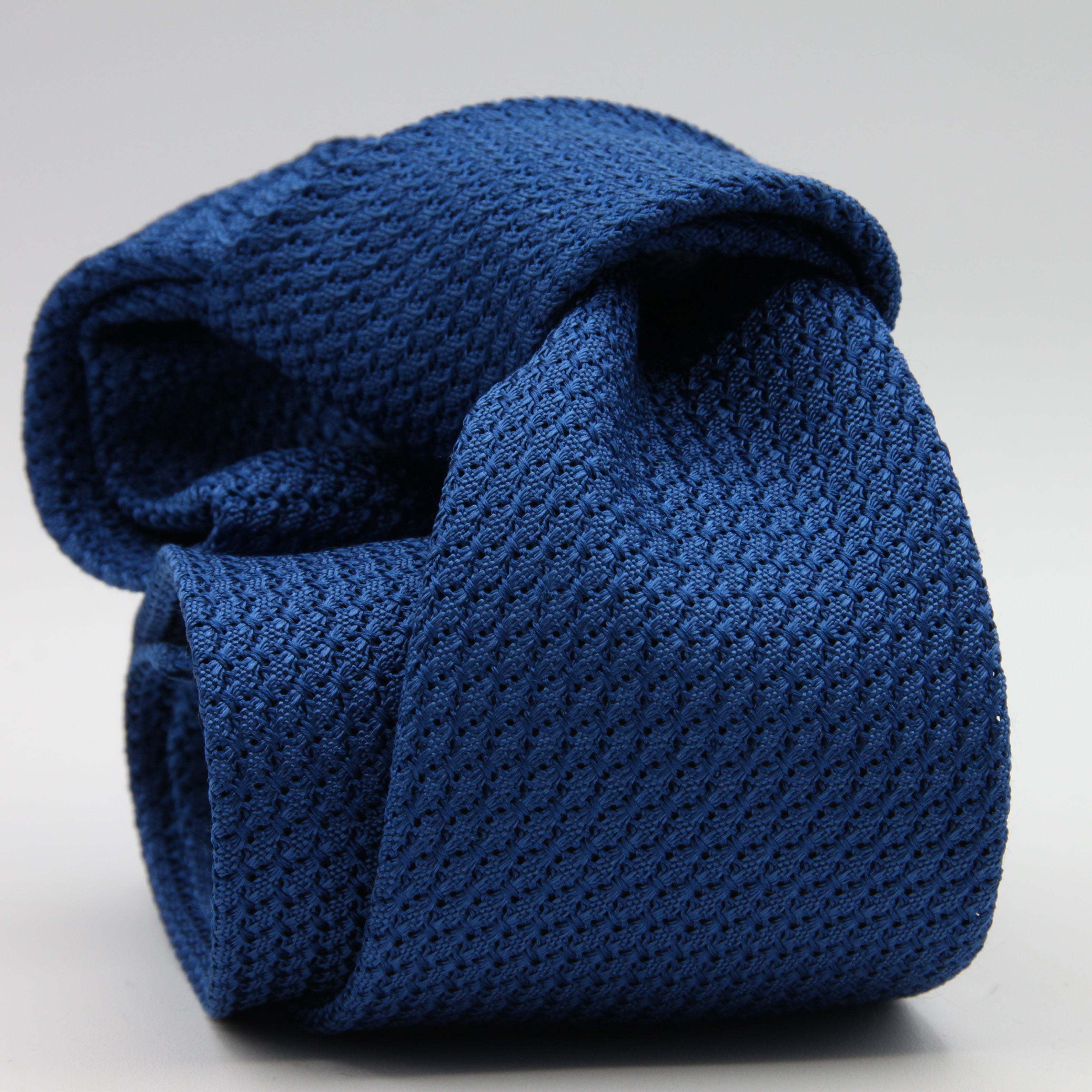 Cruciani &amp; Bella Tie
100% Silk Grenadine Garza Grossa

Unlined
Plain Olympic Blue Tie
Handmade in Italy
8 cm x 150 cm

#8602