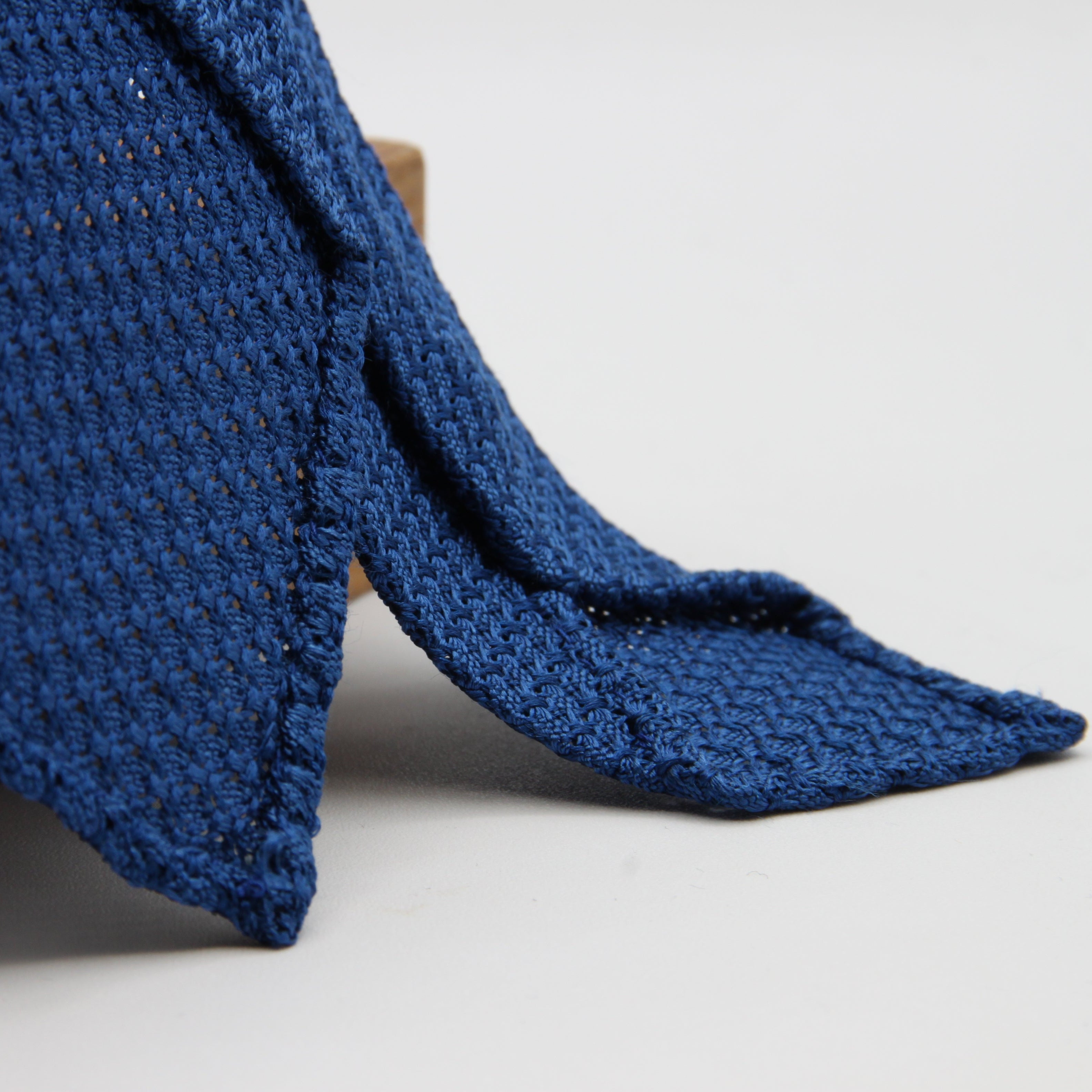 Cruciani &amp; Bella Tie
100% Silk Grenadine Garza Grossa

Unlined
Plain Olympic Blue Tie
Handmade in Italy
8 cm x 150 cm

#8602