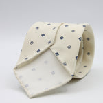 Cruciani &amp; Bella Tie
Handmade and Printed in Italy
Unlined
Hand Rolled
Off-White and Blue Tie
100% Printed Madder Silk
8 X 150 Cm
#9520