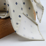 Cruciani &amp; Bella Tie
Handmade and Printed in Italy
Unlined
Hand Rolled
Off-White and Blue Tie
100% Printed Madder Silk
8 X 150 Cm
#9520