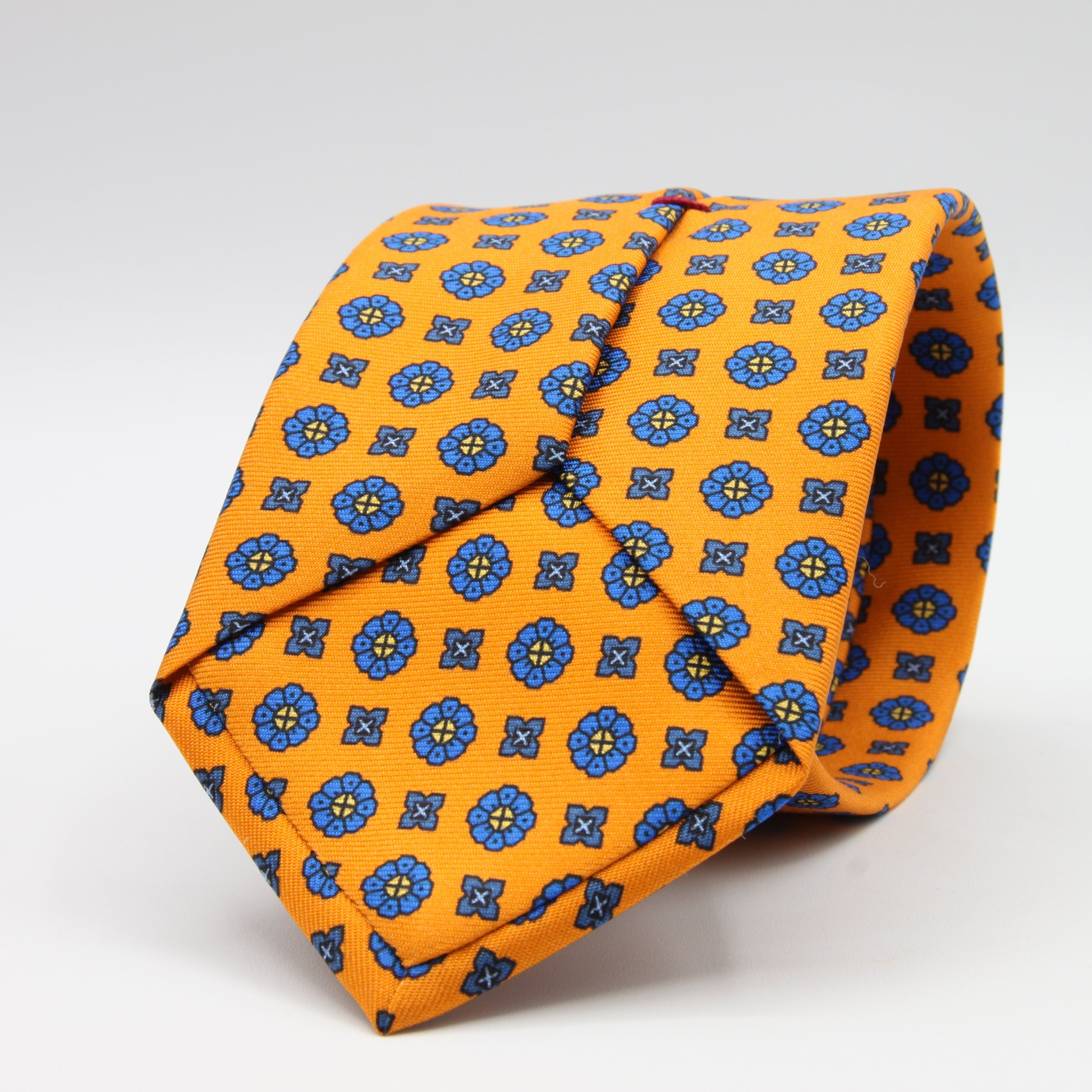 Cruciani &amp; Bella Tie
100%&nbsp; Silk
Printed and Handmade in Italy
Self-Tipped
Orange and Blue Tie

8 cm x 150 cm
#9611