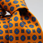 Cruciani &amp; Bella Tie
100%&nbsp; Silk
Printed and Handmade in Italy
Self-Tipped
Orange and Blue Tie

8 cm x 150 cm
#9611