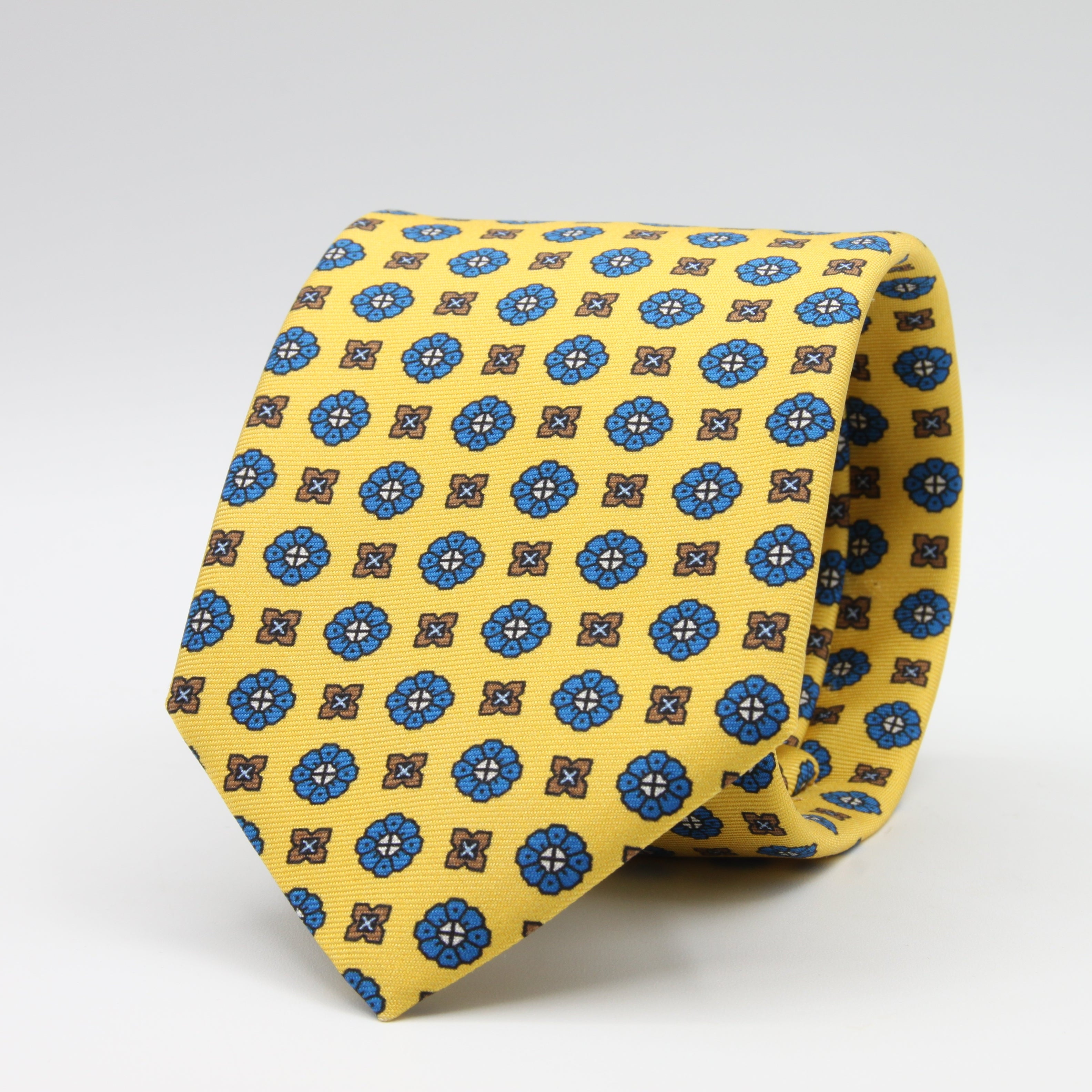 Cruciani &amp; Bella Tie
100%&nbsp; Silk
Printed and Handmade in Italy
Self-Tipped
Yellow, Blue and Brown Tie

8 cm x 150 cm
#9612