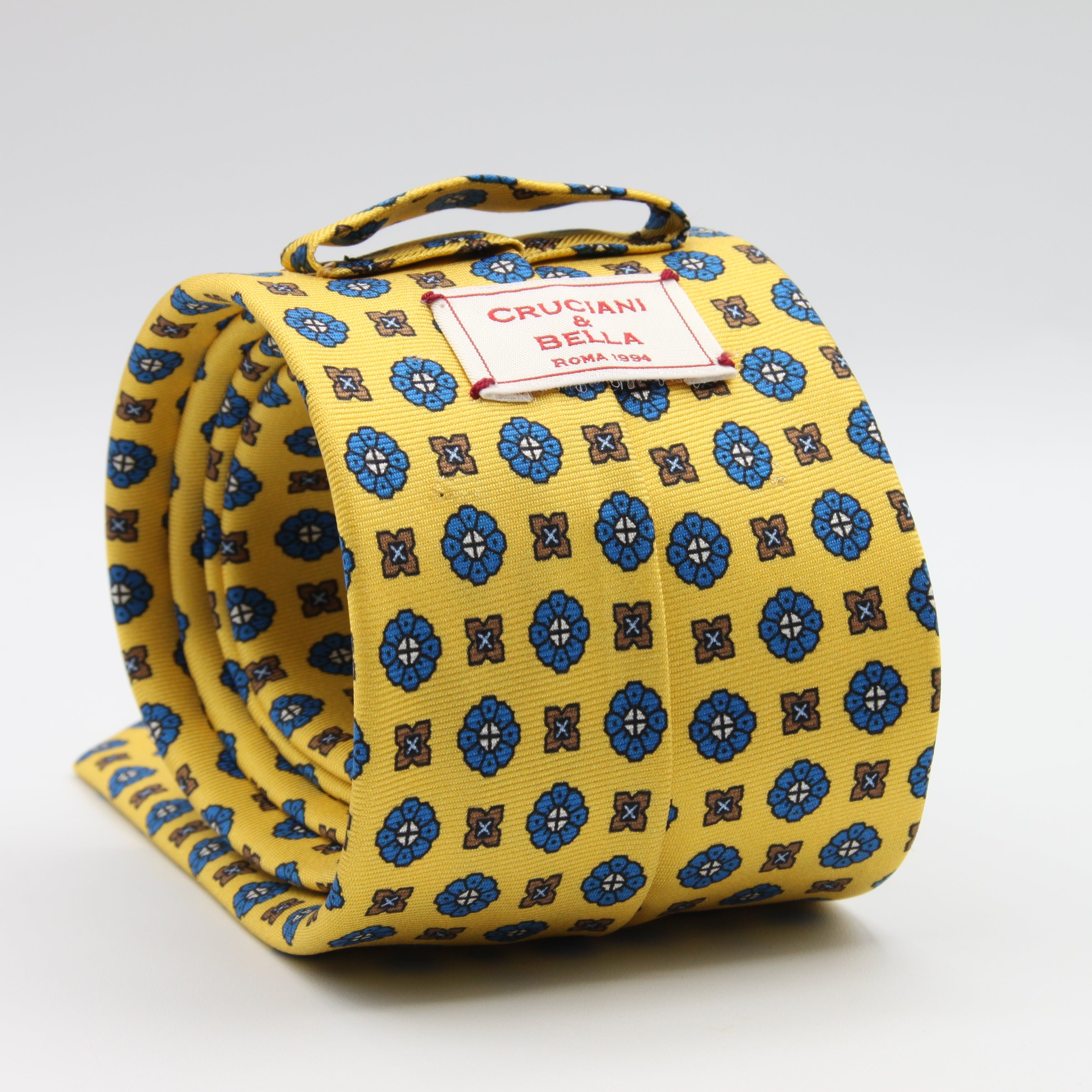 Cruciani &amp; Bella Tie
100%&nbsp; Silk
Printed and Handmade in Italy
Self-Tipped
Yellow, Blue and Brown Tie

8 cm x 150 cm
#9612