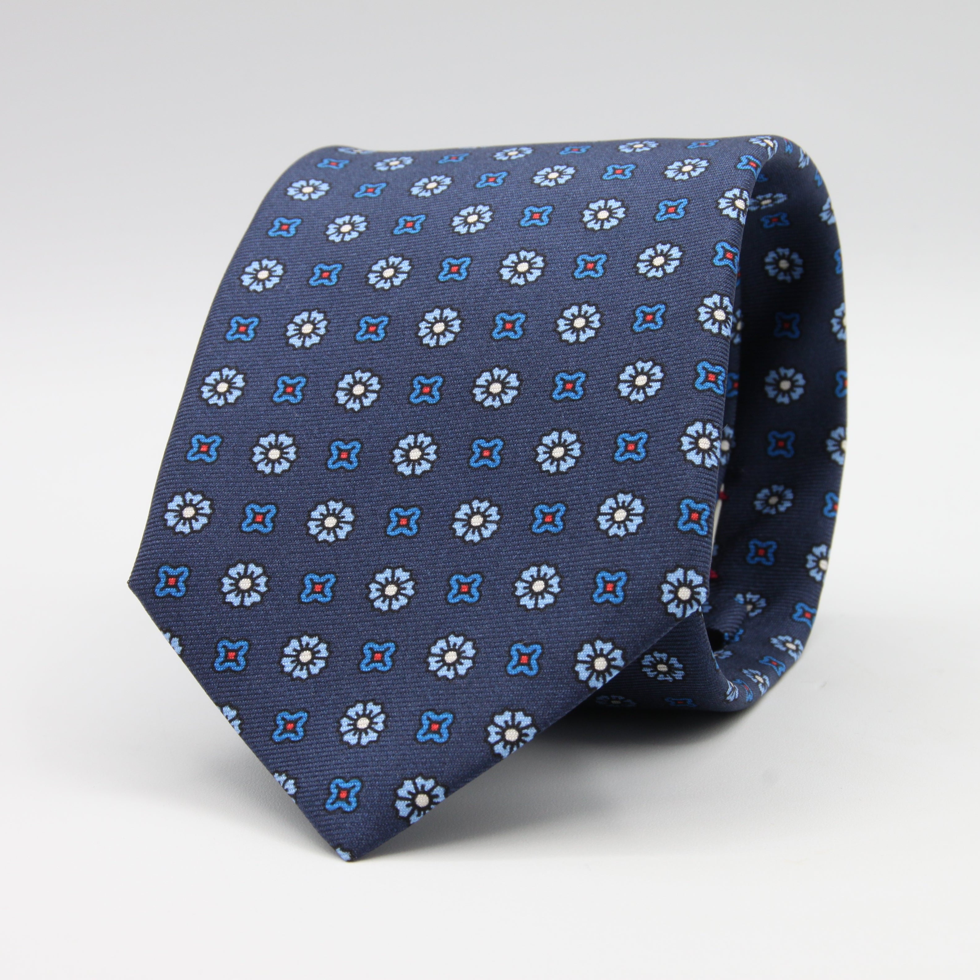 Cruciani &amp; Bella Tie
100%&nbsp; Silk
Printed and Handmade in Italy
Self-Tipped
Indigo Blue, Light Blue and Red Tie

8 cm x 150 cm
#9605