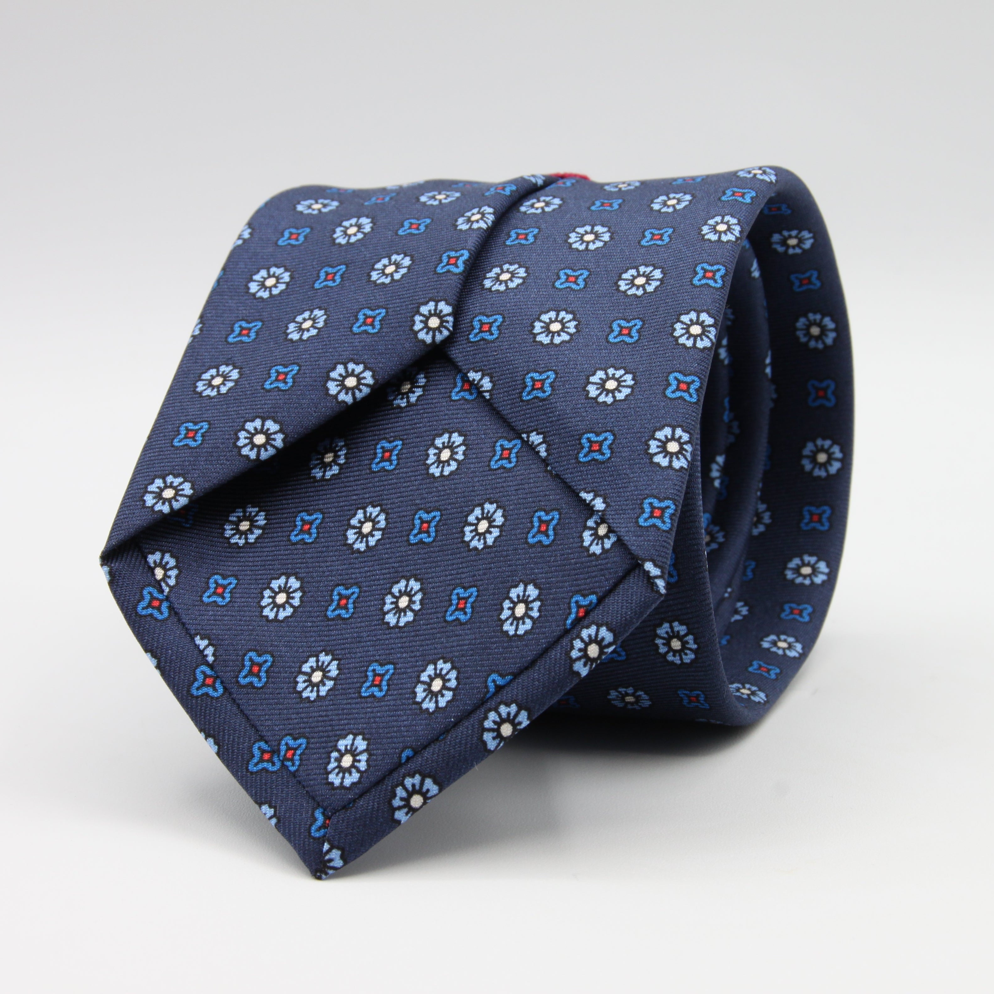 Cruciani &amp; Bella Tie
100%&nbsp; Silk
Printed and Handmade in Italy
Self-Tipped
Indigo Blue, Light Blue and Red Tie

8 cm x 150 cm
#9605