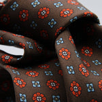 Cruciani &amp; Bella Tie
100%&nbsp; Silk
Printed and Handmade in Italy
Self-Tipped
Brown, Orange and Sky Blue Tie

8 cm x 150 cm
#9610