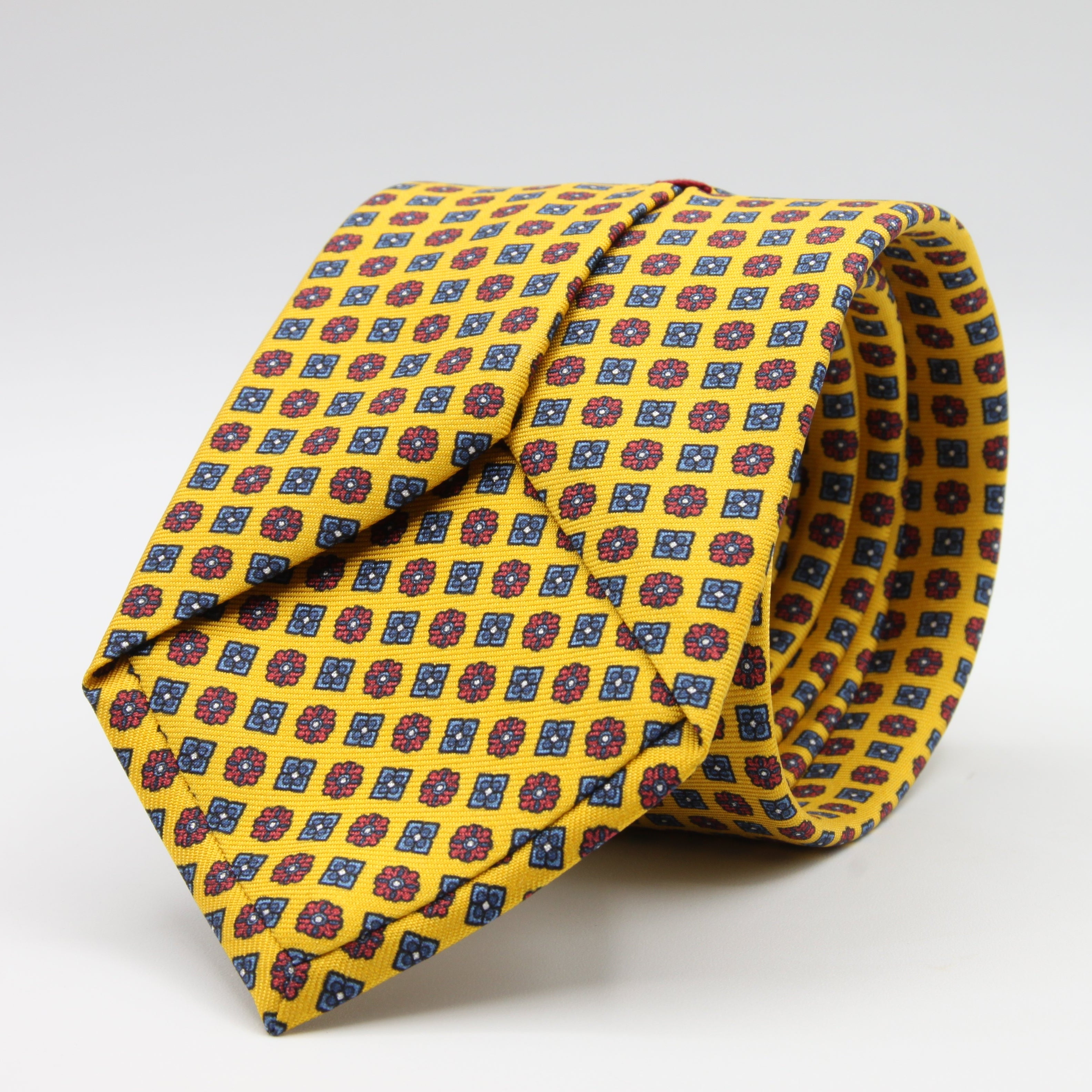Cruciani &amp; Bella Tie
100%&nbsp; Silk
Printed and Handmade in Italy
Self-Tipped
Yellow, Red and Denim Blue Tie

8 cm x 150 cm
#9614