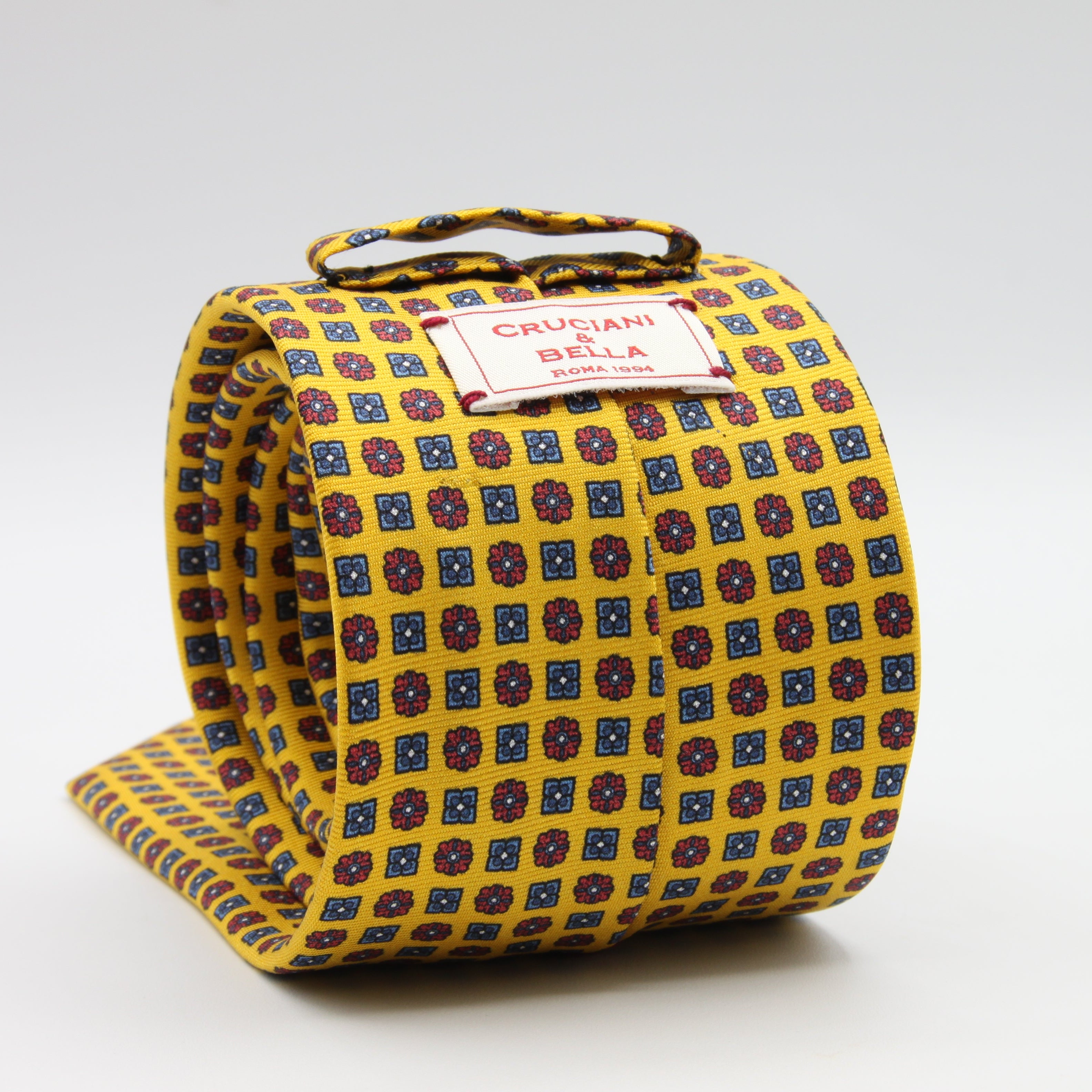 Cruciani &amp; Bella Tie
100%&nbsp; Silk
Printed and Handmade in Italy
Self-Tipped
Yellow, Red and Denim Blue Tie

8 cm x 150 cm
#9614