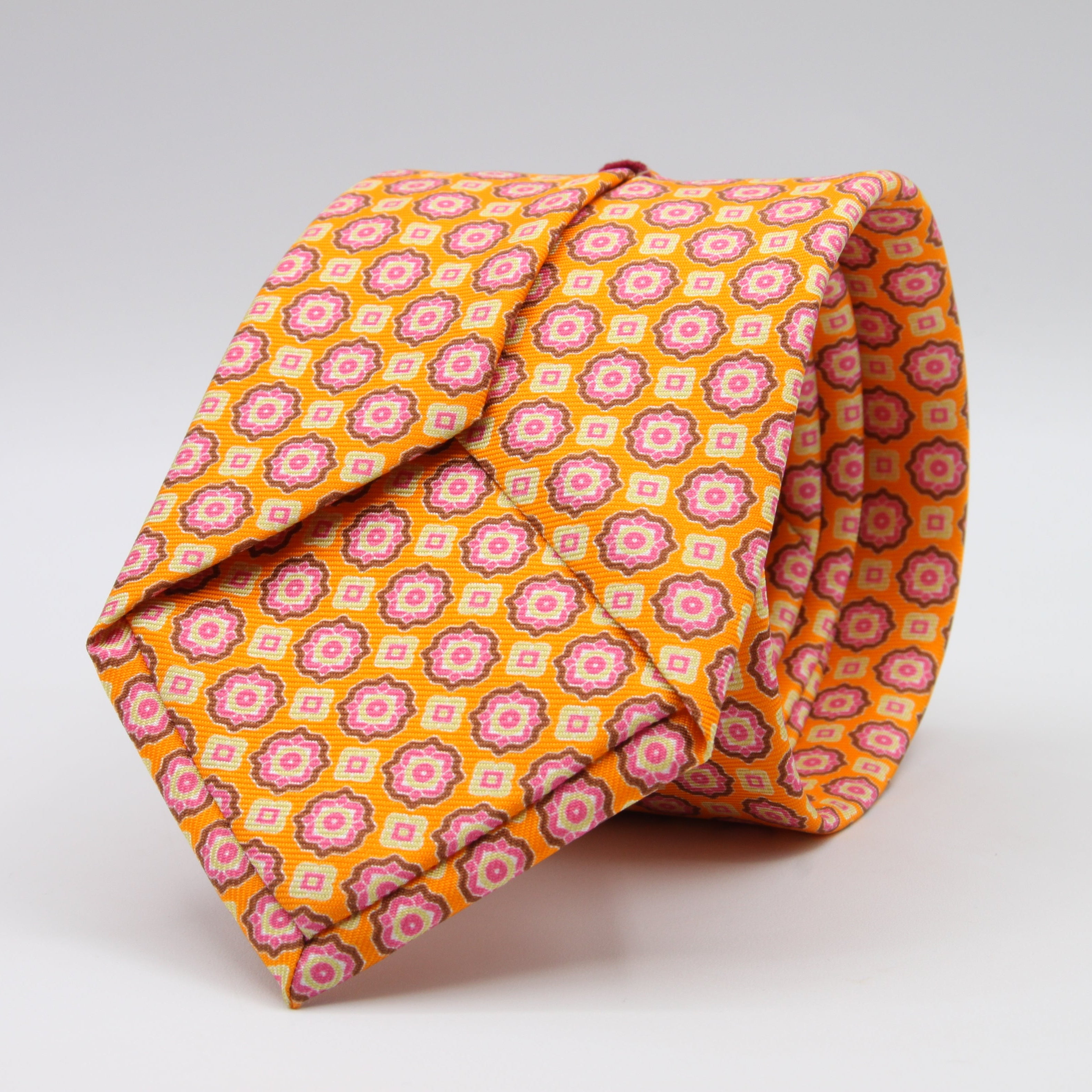 Cruciani &amp; Bella Tie
100%&nbsp; Silk
Printed and Handmade in Italy
Self-Tipped
Orange, Magenta, Brown and Cream Tie

8 cm x 150 cm
#9450