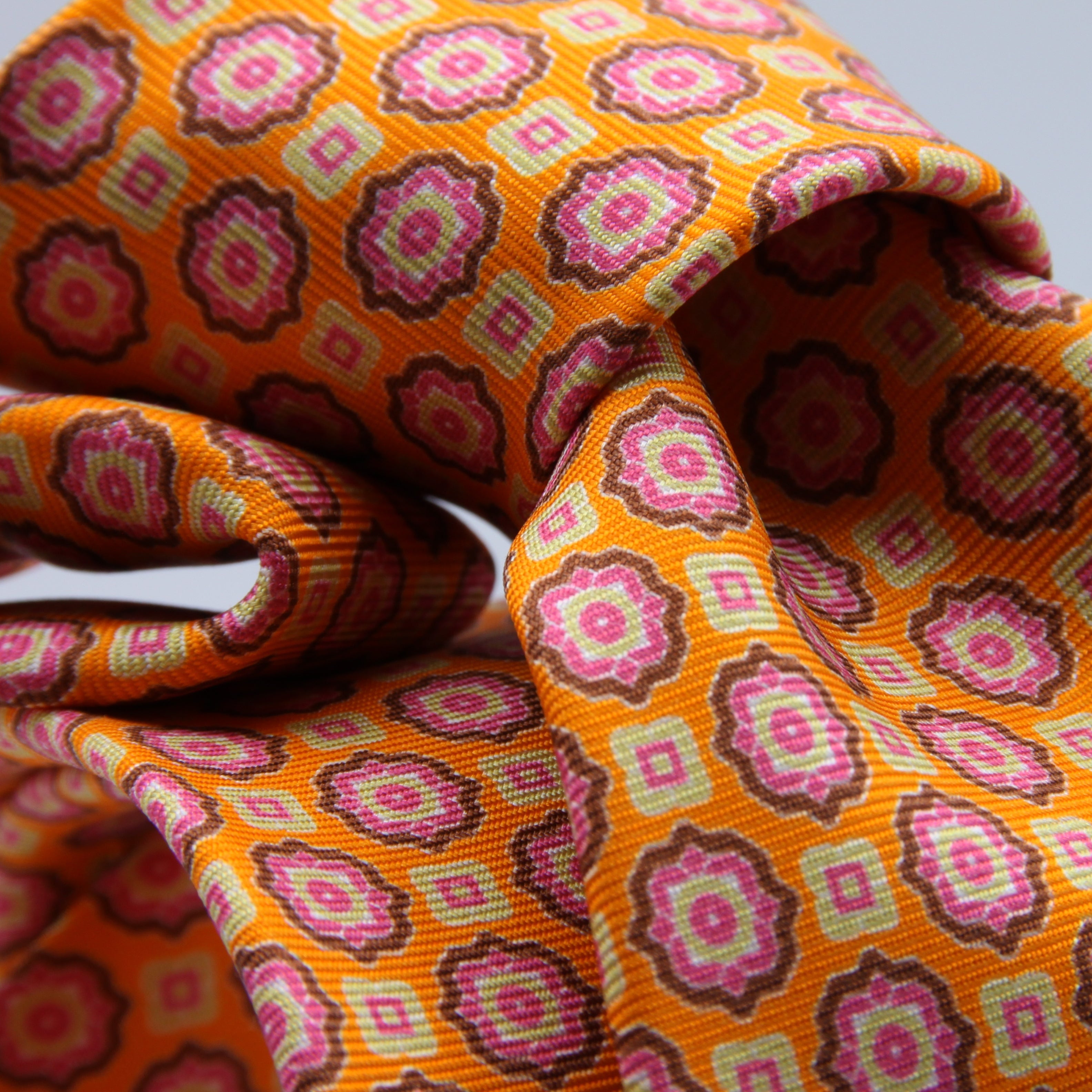 Cruciani &amp; Bella Tie
100%&nbsp; Silk
Printed and Handmade in Italy
Self-Tipped
Orange, Magenta, Brown and Cream Tie

8 cm x 150 cm
#9450