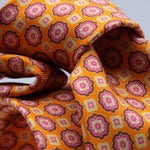Cruciani &amp; Bella Tie
100%&nbsp; Silk
Printed and Handmade in Italy
Self-Tipped
Orange, Magenta, Brown and Cream Tie

8 cm x 150 cm
#9450