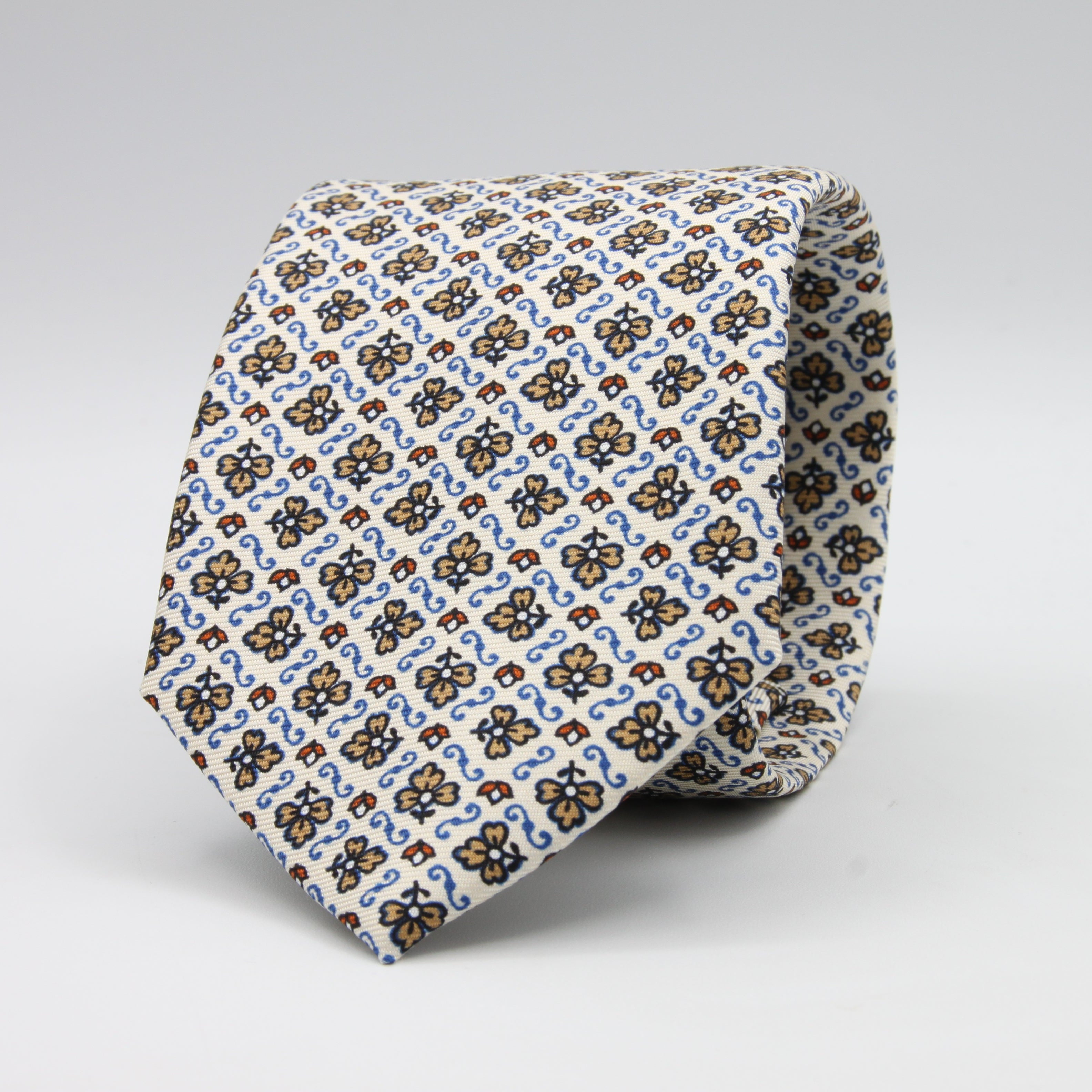 Cruciani &amp; Bella Tie
100%&nbsp; Silk
Printed and Handmade in Italy
Self-Tipped
Off-White, Cream, Rust and Sky Blue Tie

8 cm x 150 cm
#9459