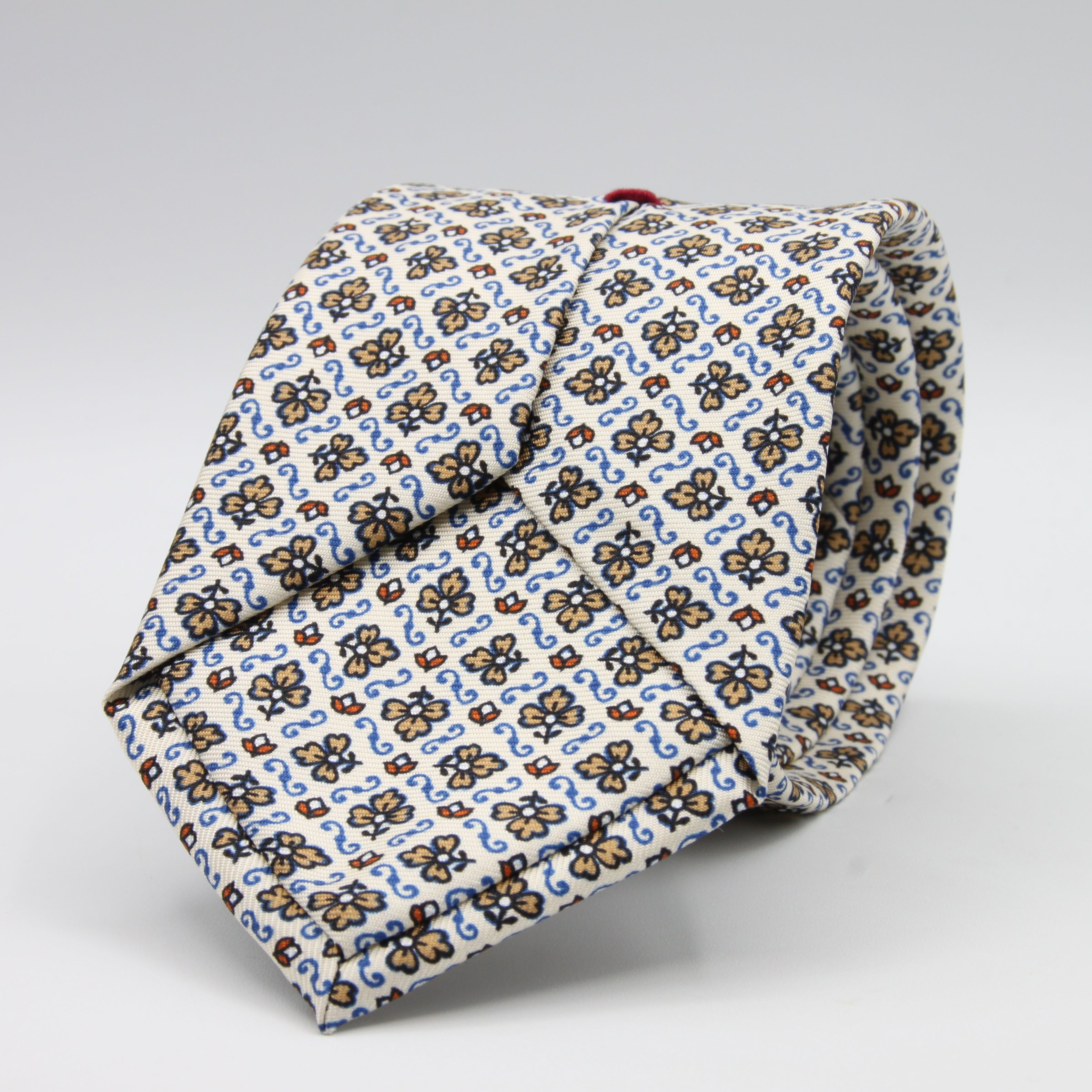 Cruciani &amp; Bella Tie
100%&nbsp; Silk
Printed and Handmade in Italy
Self-Tipped
Off-White, Cream, Rust and Sky Blue Tie

8 cm x 150 cm
#9459