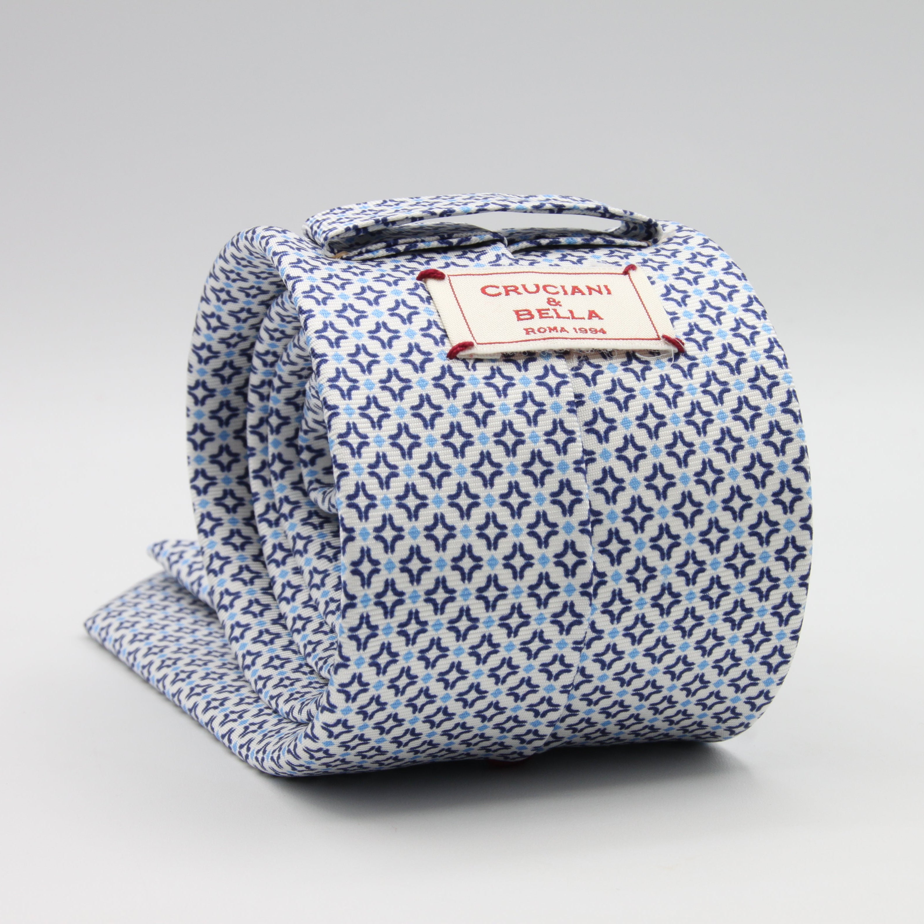 Cruciani &amp; Bella Tie
100%&nbsp; Silk
Printed and Handmade in Italy
Self-Tipped
White, Blue and Sky Blue Tie

8 cm x 150 cm
#9464